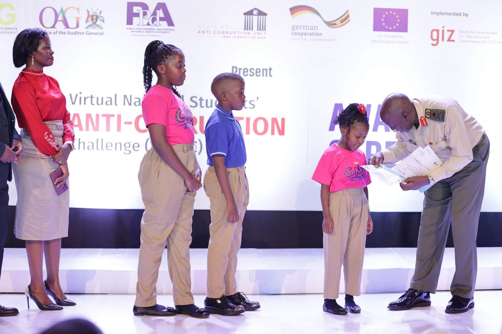 Brig Gen Henry Isoke Presides Over as Chief Guest at the 3rd Virtual National Students Anti-Corruption Challenge awards 2024.